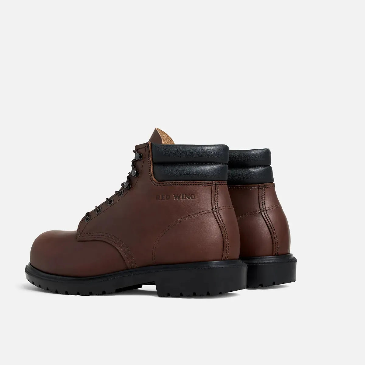 Red Wing 2545 SuperSole X 6-Inch Safety Boot - rear view of pair showing padded collar, Red Wing embossed heel counter and SuperSole X black outsole
