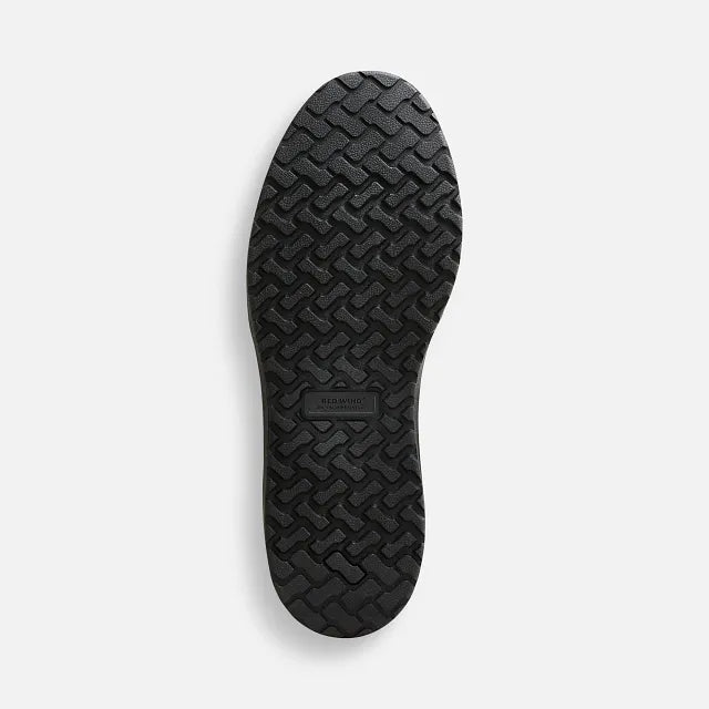 Red Wing 2182 Draftsmith Oxford Safety Shoe - outsole view showing TredLucent black slip resistant rubber tread pattern