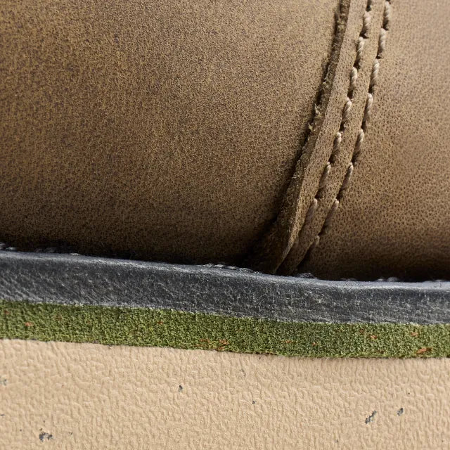 Red Wing 2476 Traction Tred Lite 6-Inch Safety Boot - lifestyle shot showing boot in heavy-duty work environment