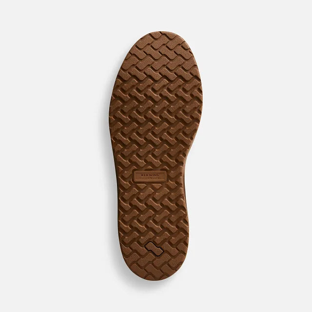 Red Wing 3538 Draftsmith Slip-On Safety Shoe - outsole view showing TredLucent brown slip resistant rubber tread pattern